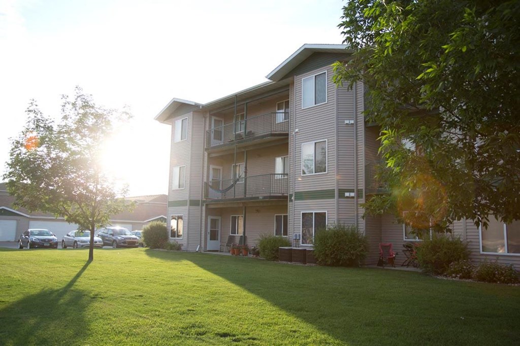 Exterior of Cottonwood Apartment Homes with spacious balconies and patios.