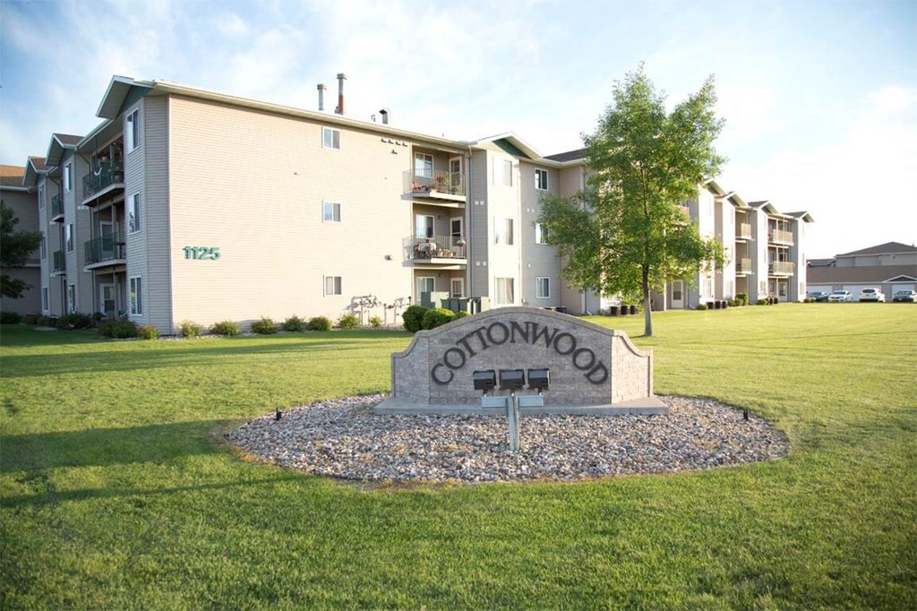 Exterior of Cottonwood Apartment Homes leasing office.