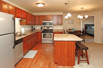 Full Kitchen with Island and Dining Table - Photo Gallery 4