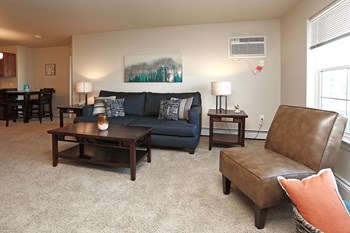 Carpeted Living Room with Couch and Coffee Table - Photo Gallery 2