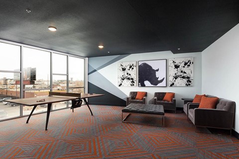 Leisure Room with Ping Pong and Couch at Dylan at RiNo, Denver, CO