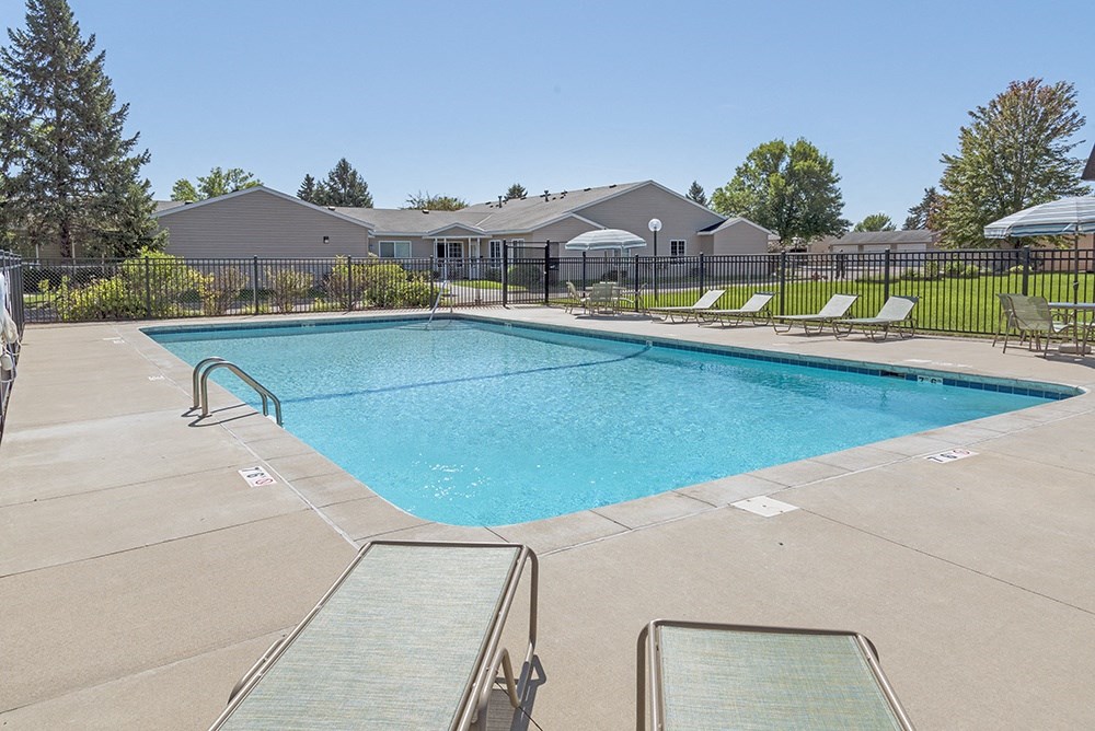 our apartments have a resort style pool with lounge chairs