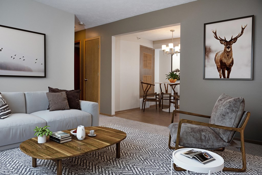 Furnished Living Room with Wall Art, Coffee Table and Couch