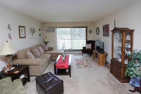 a living room with a couch and a table