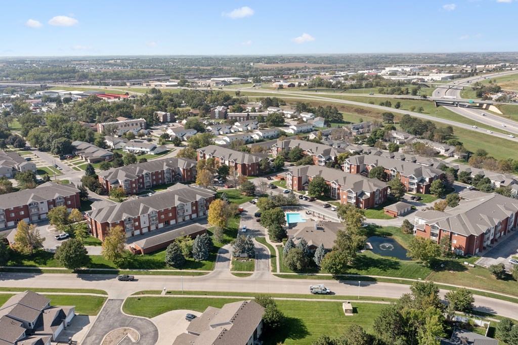 A view of a residential area with houses and a road.