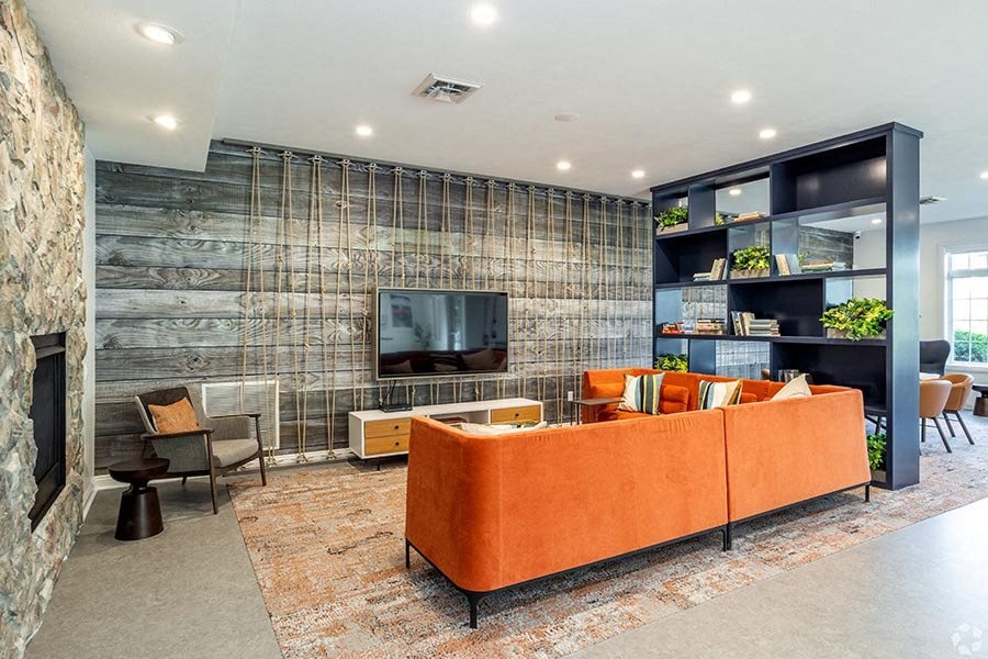 Community clubhouse with stone fireplace for lounging or entertaining