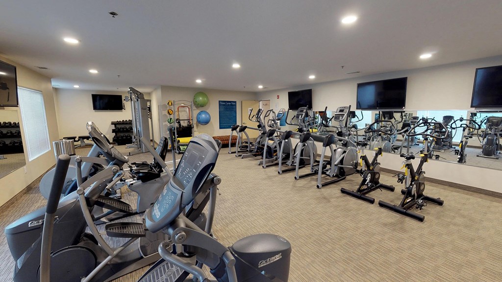 the state of the art gym at the village apartments