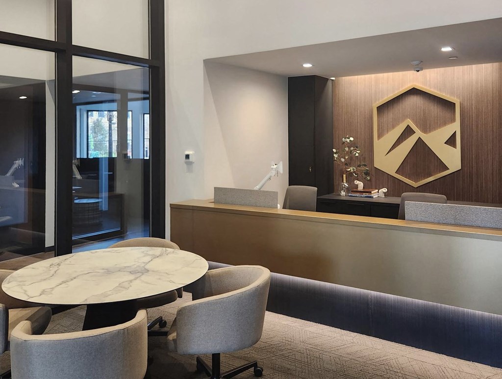 a table and chairs in a hotel lobby