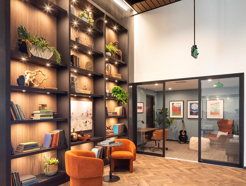 a room filled with furniture and a large window