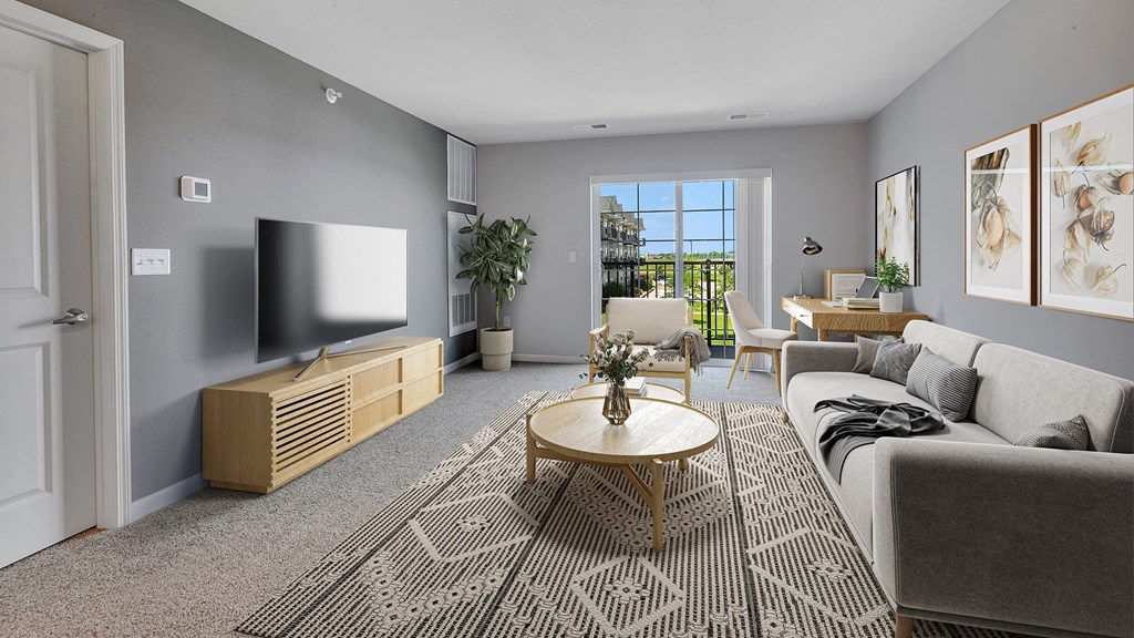 an open living room with a couch and a table