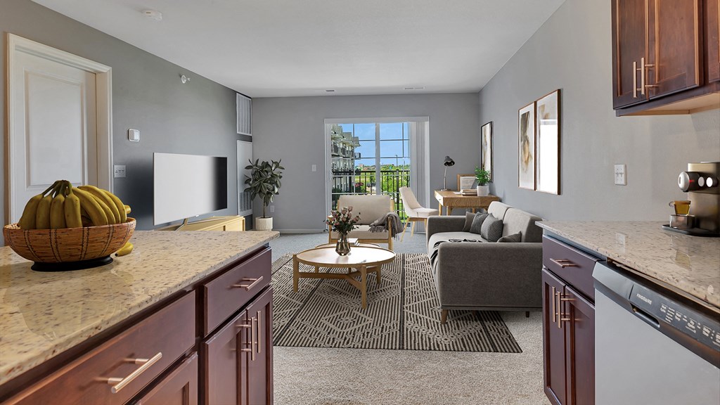 an open floor plan with a living room and a kitchen