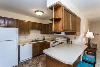 Full Kitchen with Attached Island, Overhead Cabinets and Appliances - Photo Gallery 3