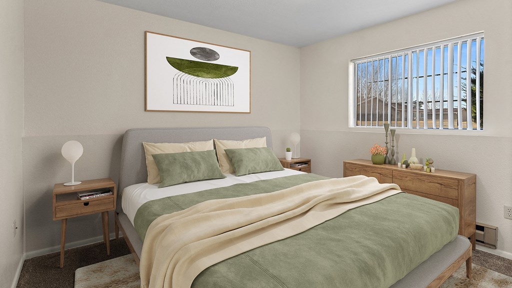 a bedroom with a bed and a window