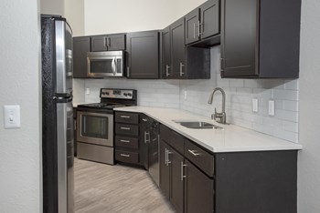 Kitchen with Fridge and Cabinets - Photo Gallery 4