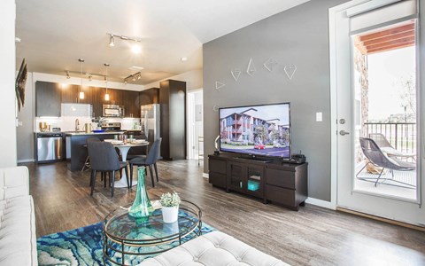 a living room with a couch and a tv