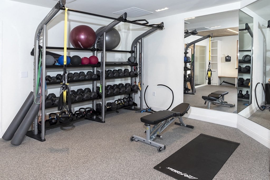 the gym at the flats at big tex apartments