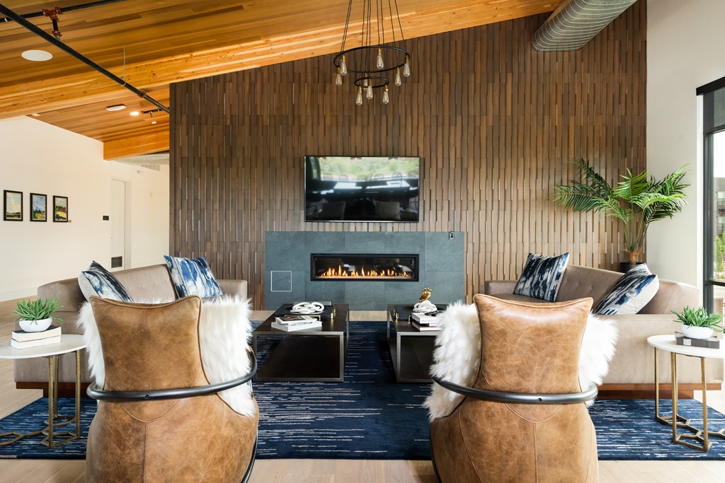 Clubhouse fireside lounge with TV and comfortable seating