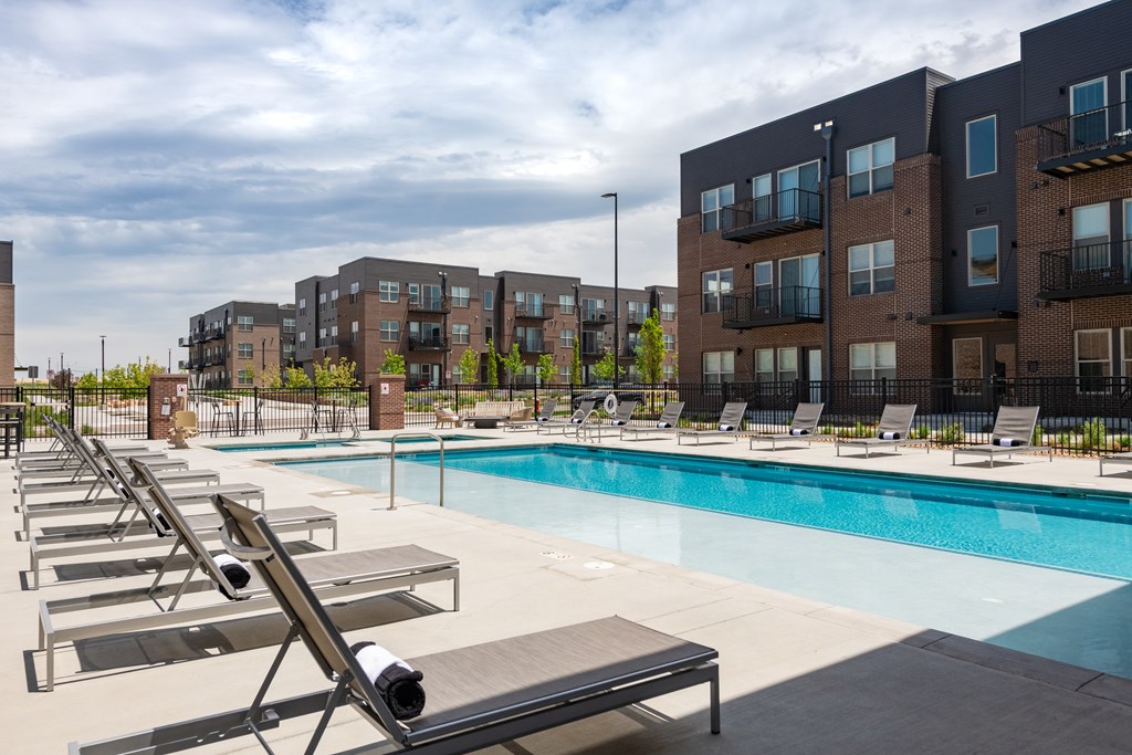 Outdoor pool with sun loungers 