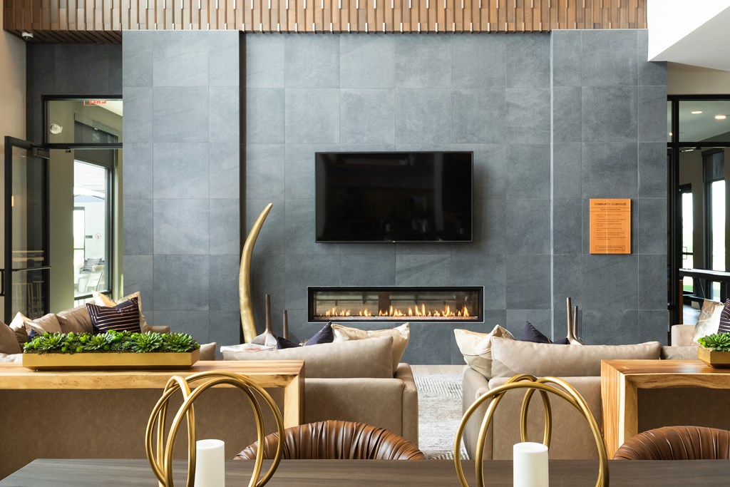 Fireplace Lounge in the clubhouse with cozy seating 