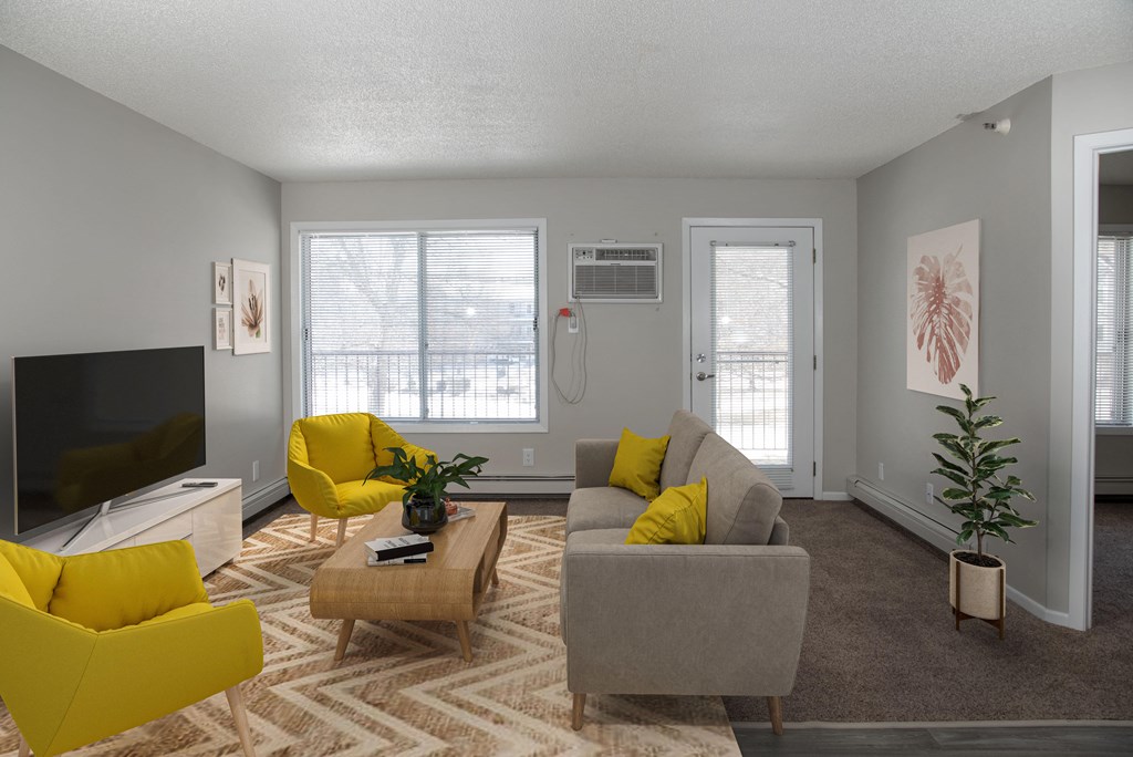 Bright and airy living space that leads out to your private patio or balcony. Living area has large window next to patio door as well.