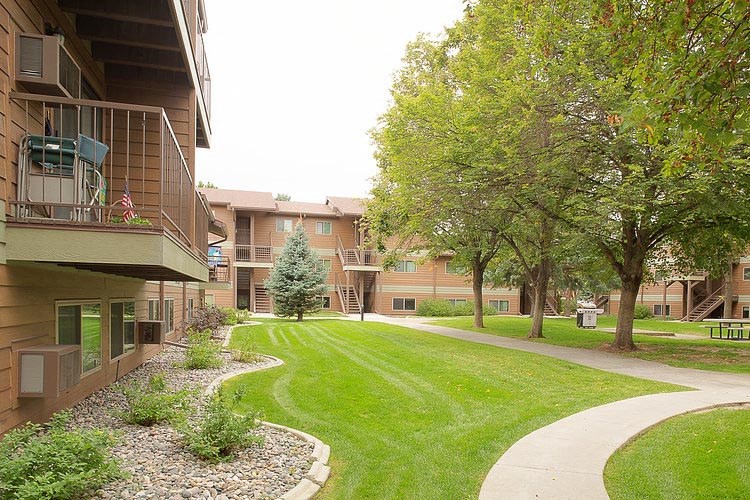 Interior Courtyard with Green Lawns, Trees and Sidewalks