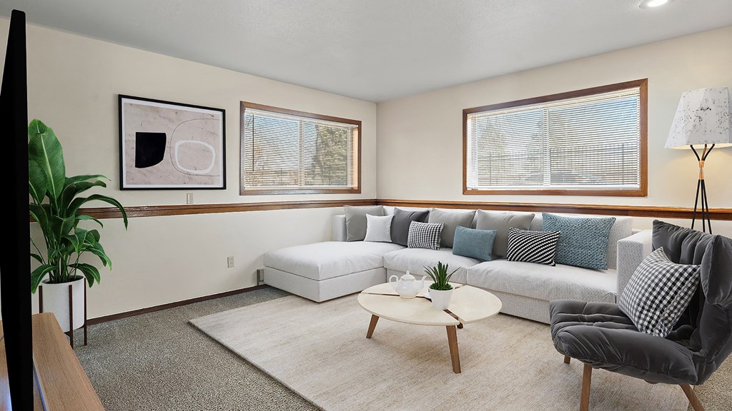 a living room with a couch and a coffee table
