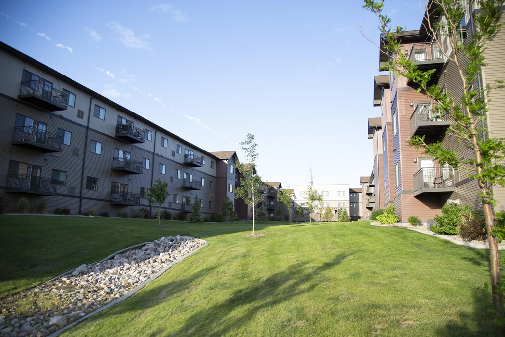 Exterior River Ridge Balconies and Green Lawn