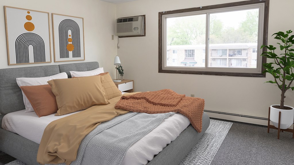 a bedroom with a bed and a window