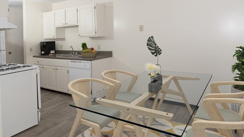 a dining room with a glass table and chairs in a kitchen
