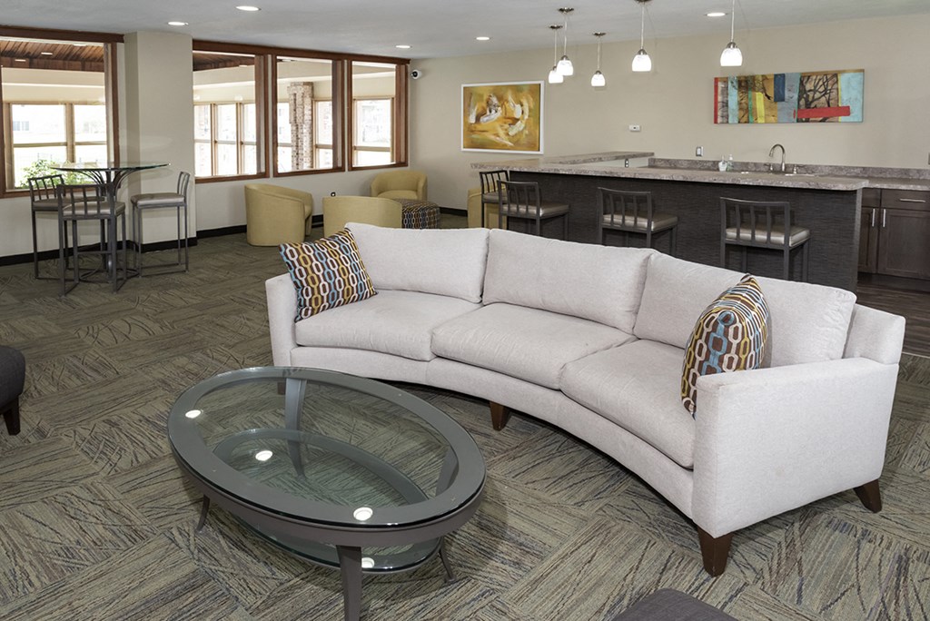 a living room with a couch and a table