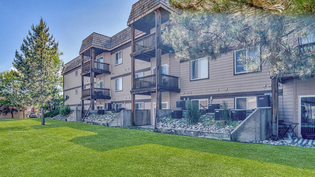 our apartments are located in a quiet neighborhood with a lawn