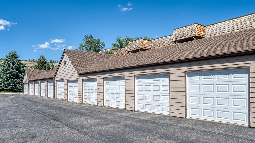 a row of garage doors on the side of a building