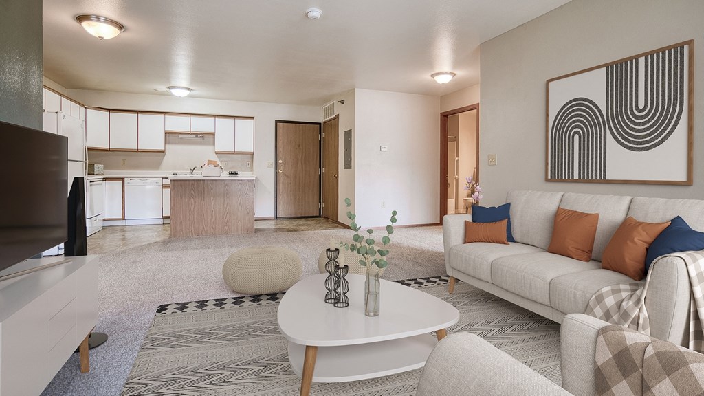 a living room with a couch and a table