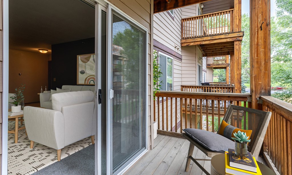 a living room with sliding glass doors to a deck