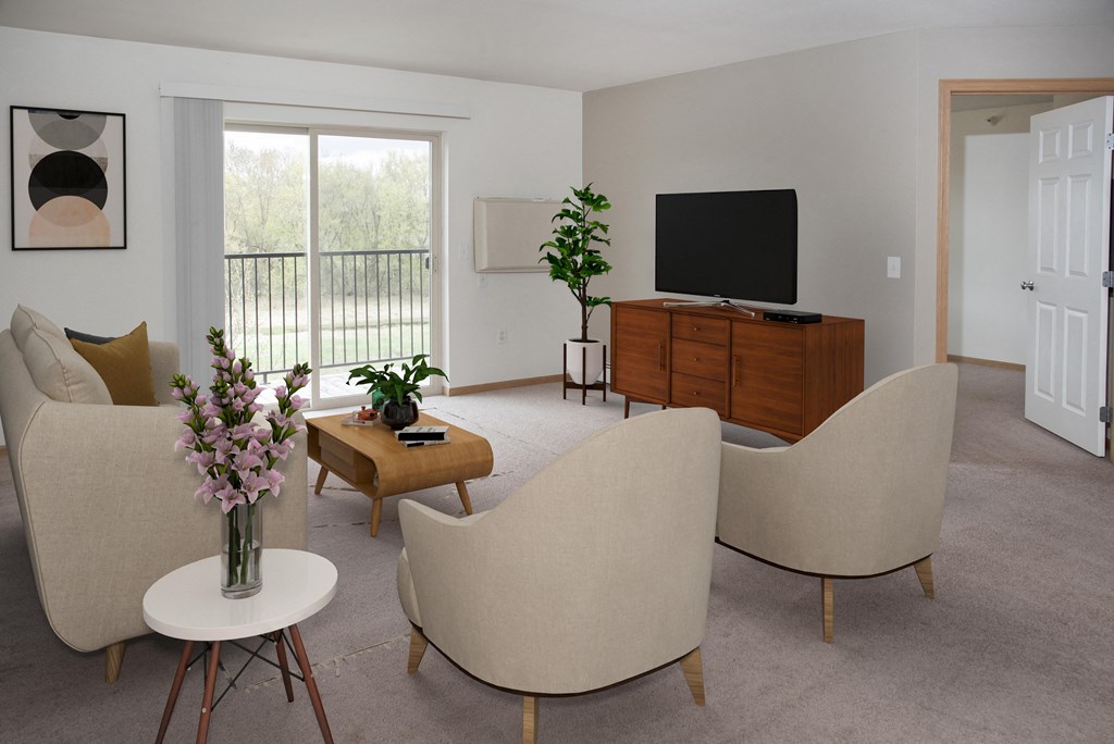 Carpeted Living Room with Chairs, Sofa, and TV