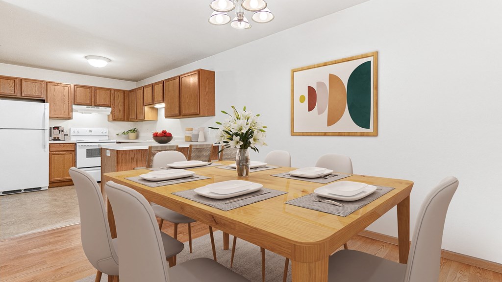 a dining room with a wooden table and chairs