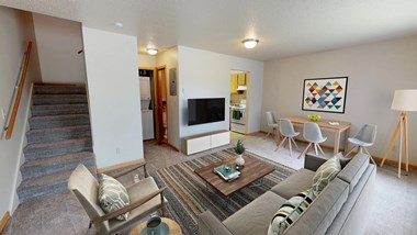 Furnished Living Room with Rug and TV, Staircase to 2nd Floor