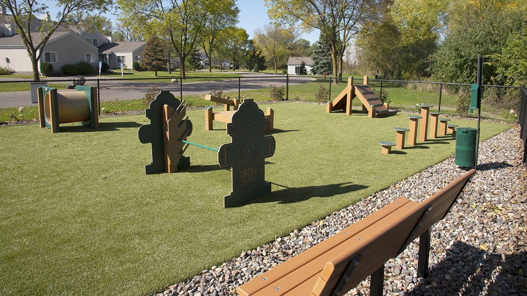 a fire hydrant in the middle of a playground