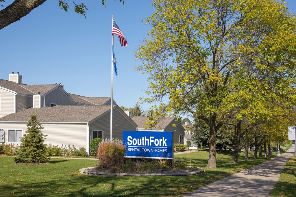 Exterior SouthFork Entrance with Sign and Flagpole