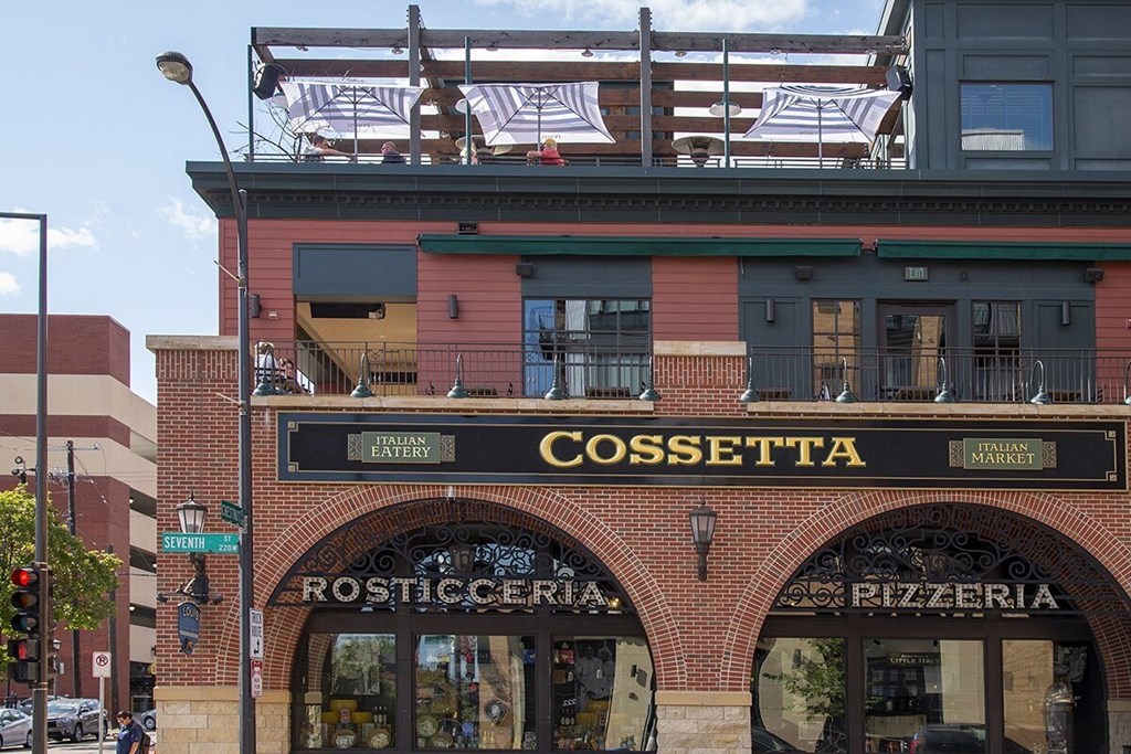 a brick building with a sign that reads cosentina