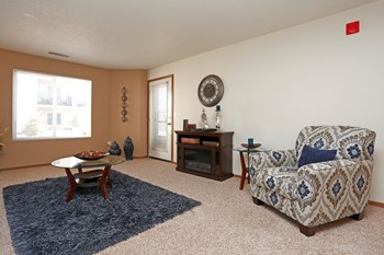 Natural light filling the living room with large wall perfect for decorating. - Photo Gallery 4