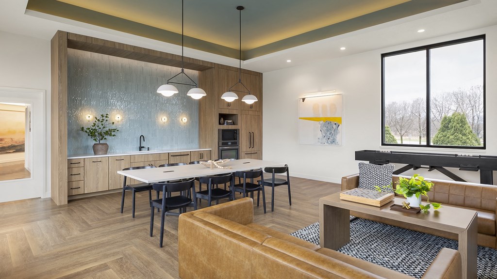 a rendering of a living room and dining room with a table and chairs