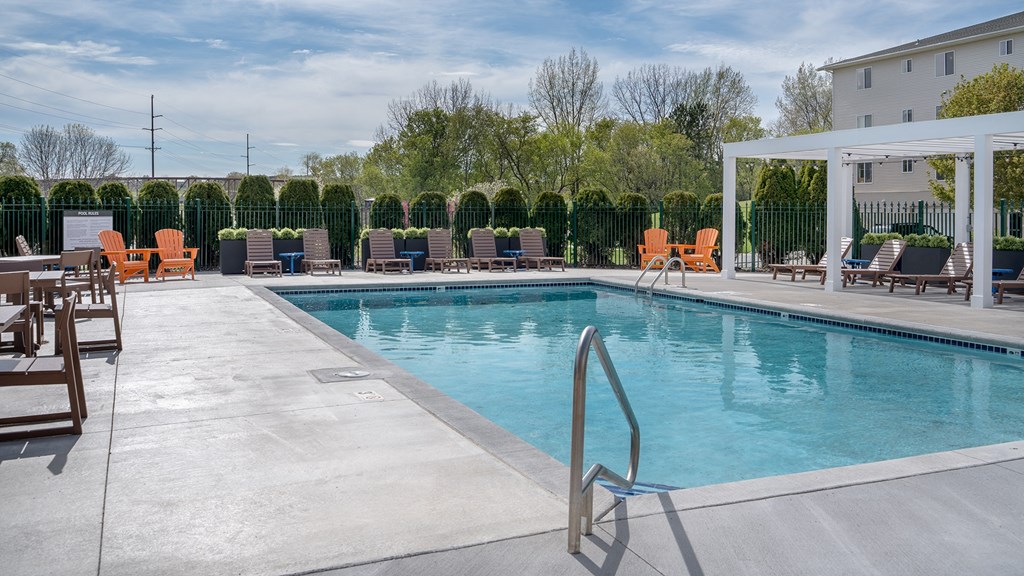 our apartments have a large pool and lounge chairs