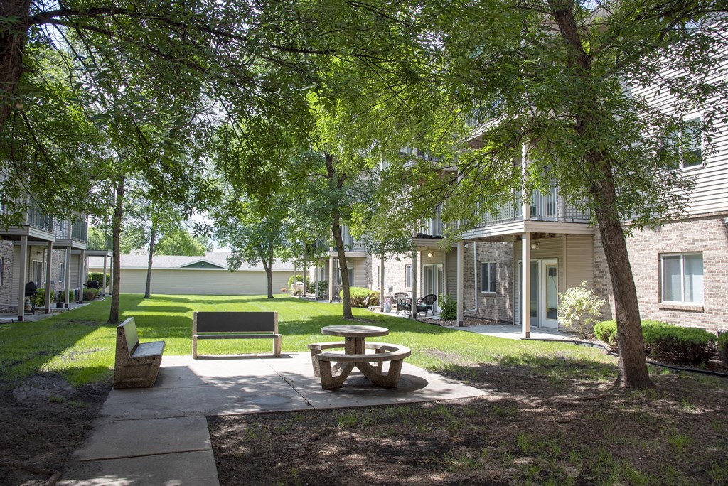 Private outdoor picnic area and green space perfect for spending time outside.