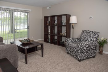 Furnished Living Room with Cabinet and Sliding Glass Door - Photo Gallery 3