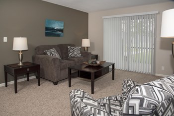 Furnished Living Room with Sliding Glass Door - Photo Gallery 2