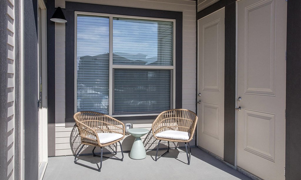 Private Patio with Chairs and Door