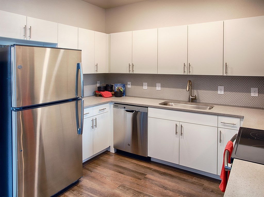Kitchen with Appliances and White Cabinets