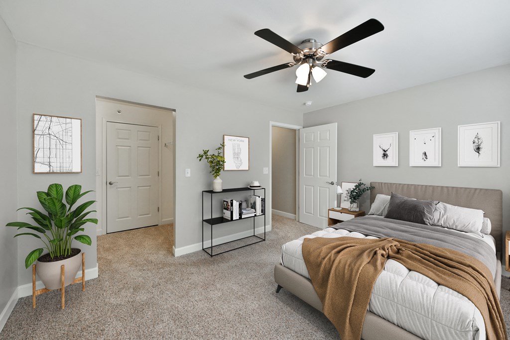 Bedroom with Bed and Fan