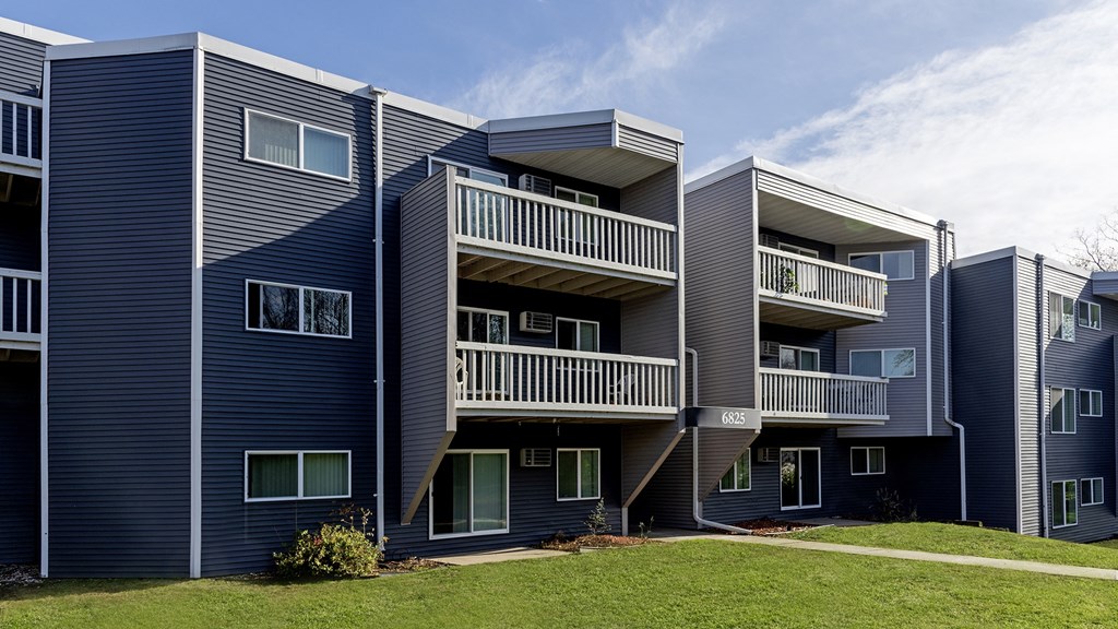 a row of modern apartment buildings with balconies